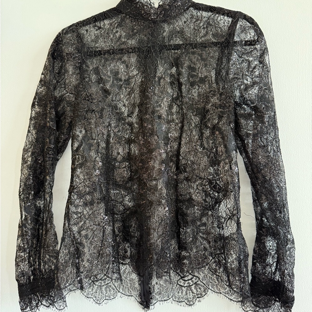 Chic Black Blouse with Intricate Design